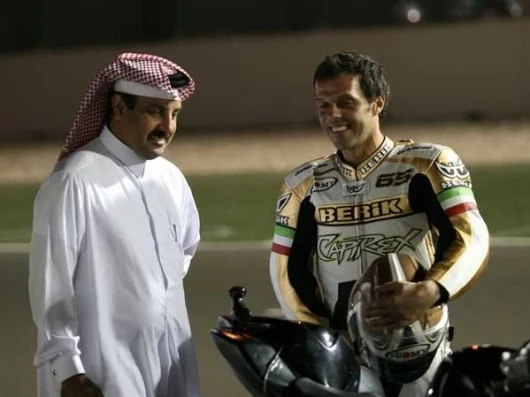 Loris Capirossi and one of the organisers