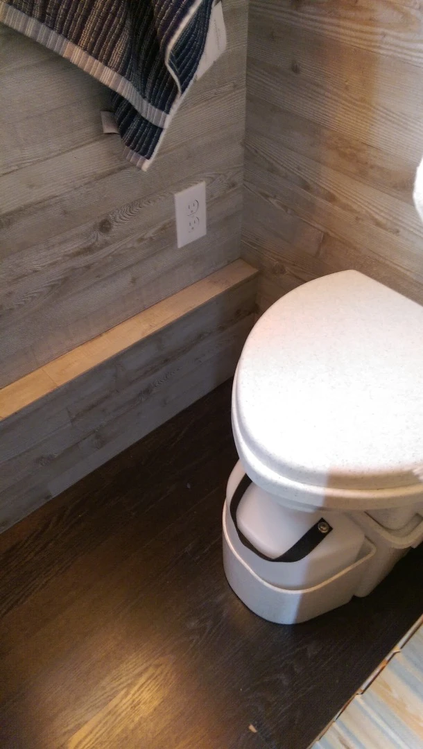 The Tiny Ski Lodge includes a composting toilet in the bathroom