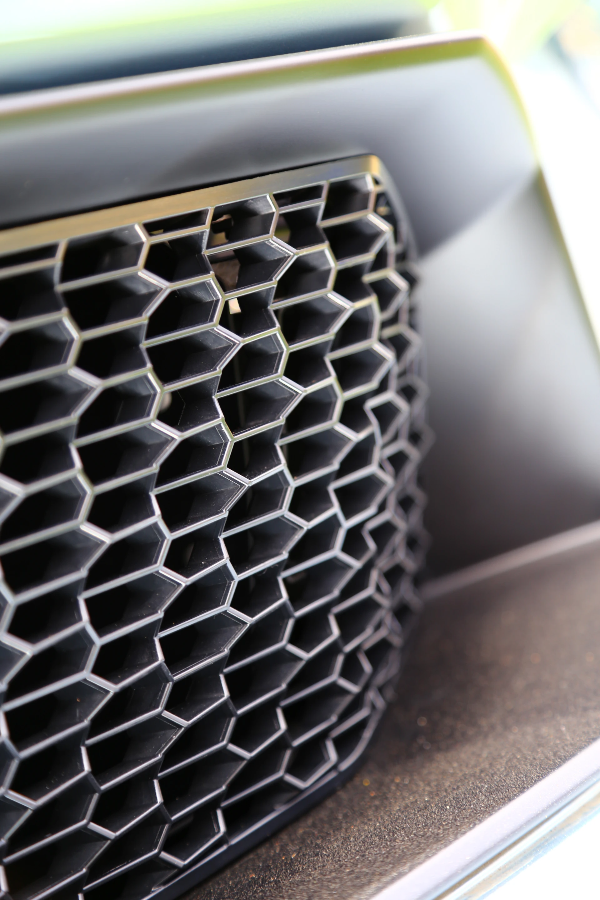 More offset hexagonal shapes, this time in the rear diffuser ... the staggered design helps diffuse air in a more calculated manner (Photo: Angus MacKenzie/Gizmag.com)