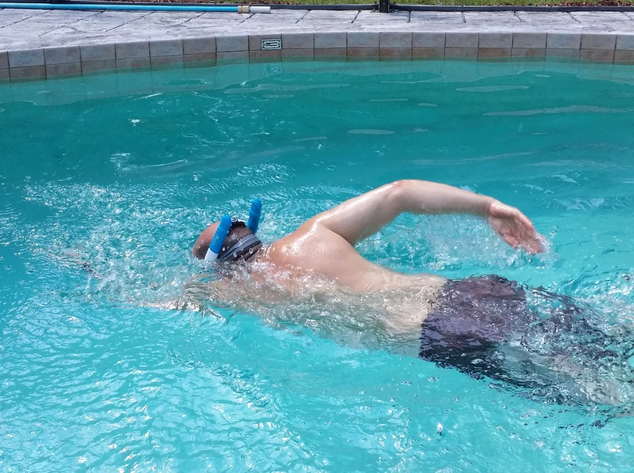 Two rigid tubes keep the water out while you swim