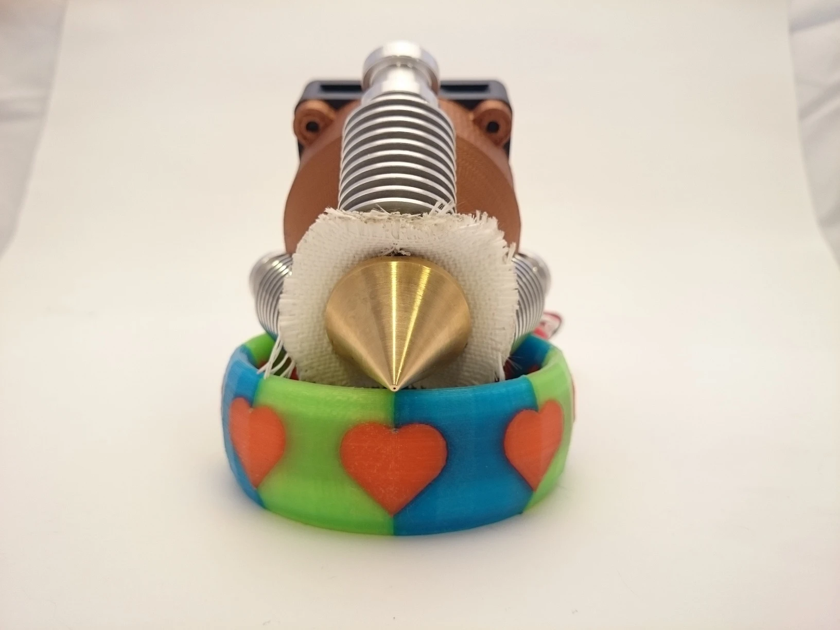 The Diamond Hotend is a color extruder for 3D printers that can accept and mix up to three colors of filaments