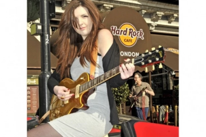 18 year old Karis Chandler guitar expert demonstrates the Gibson Les Paul 1952