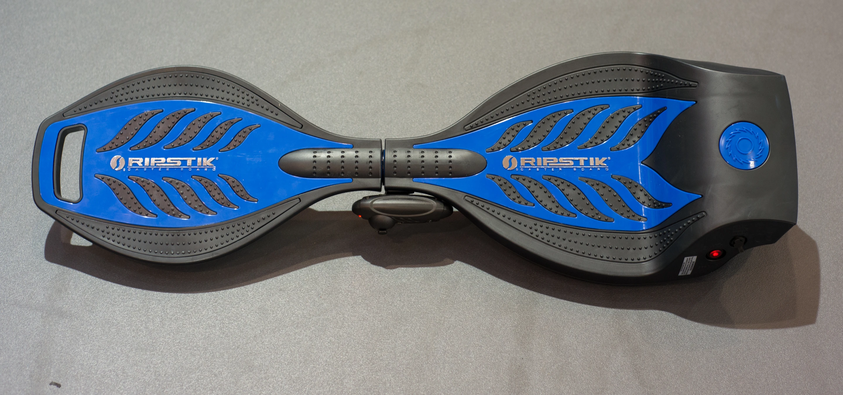 The Razor RipStik Electric with the remote control attached