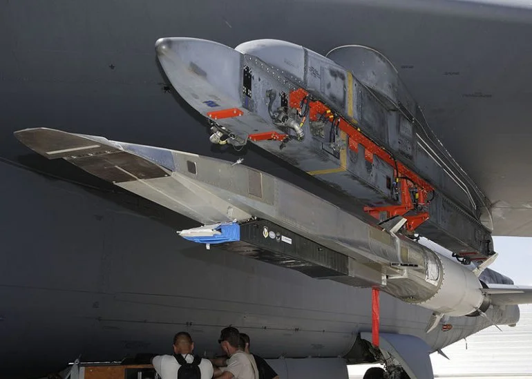 The X-51A WaveRider hypersonic flight test vehicle mounted on an Air Force Flight Test Center B-52