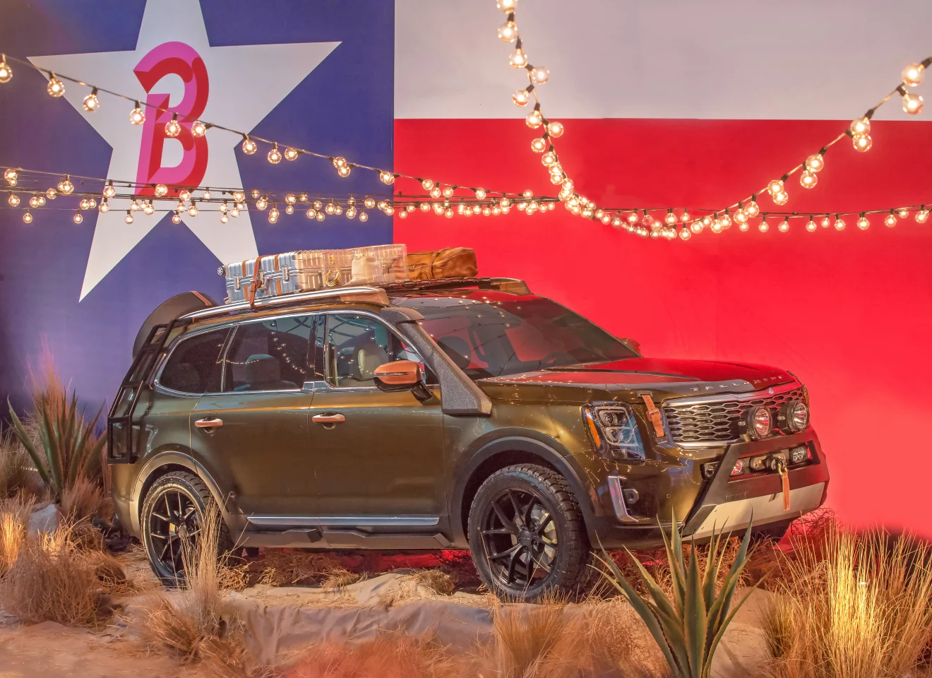 A rugged front bumper with off-road lights and custom roof rack give the Telluride a nomadic look
