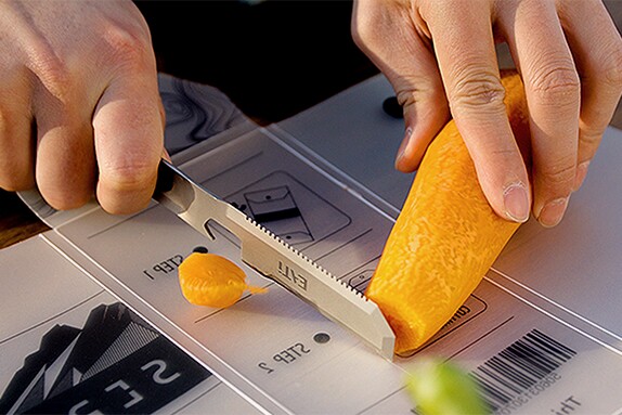 The included carrying sleeve doubles as a cutting board