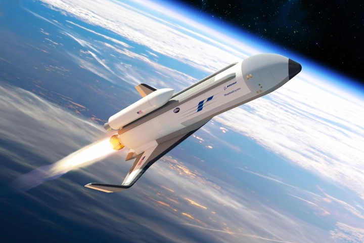 Phantom Express shown preparing to launch its expendable second stage on the top of the vehicle in this artist’s concept