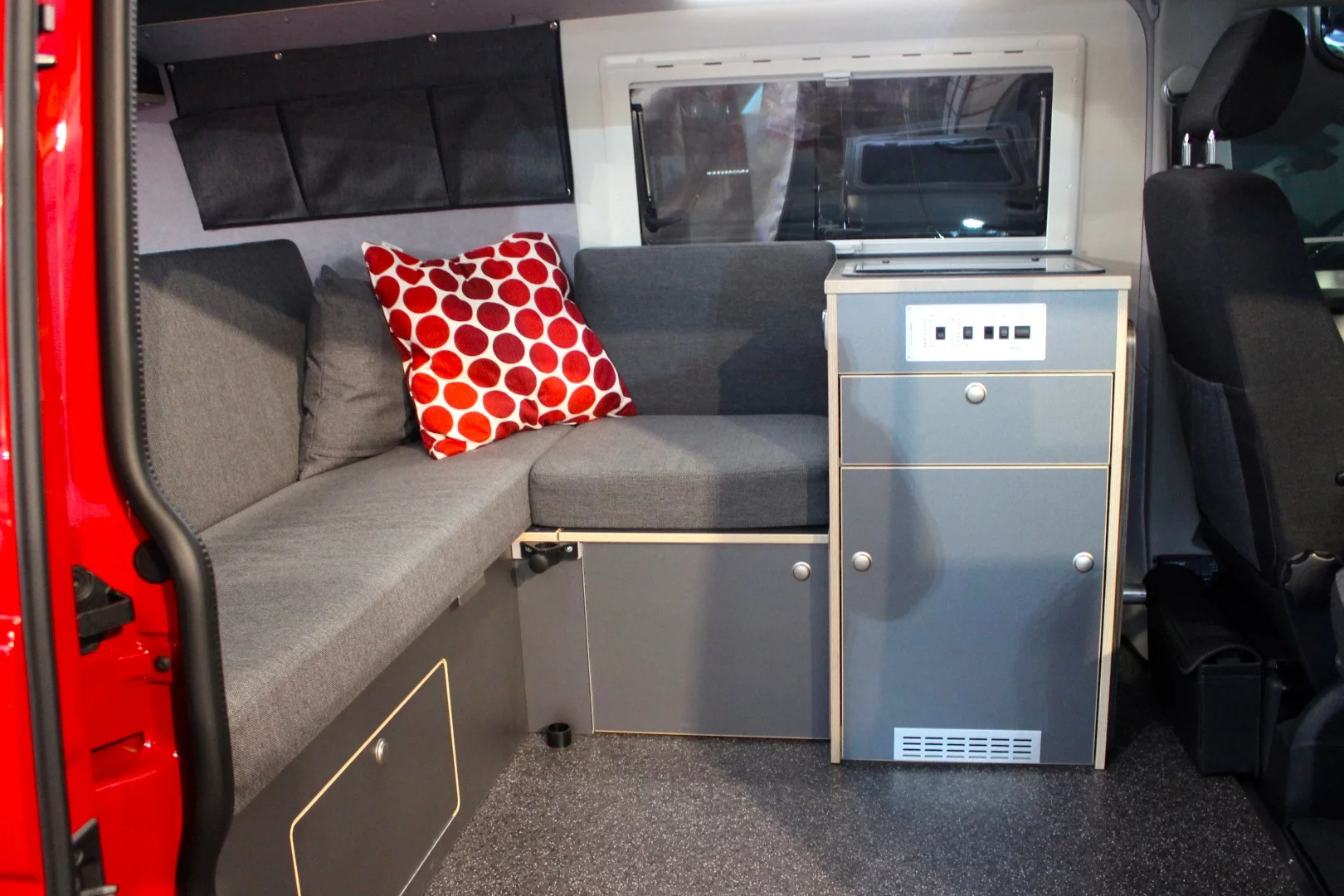 Werz puts a smaller kitchen block and L-shaped couch in its Piccolo camper van