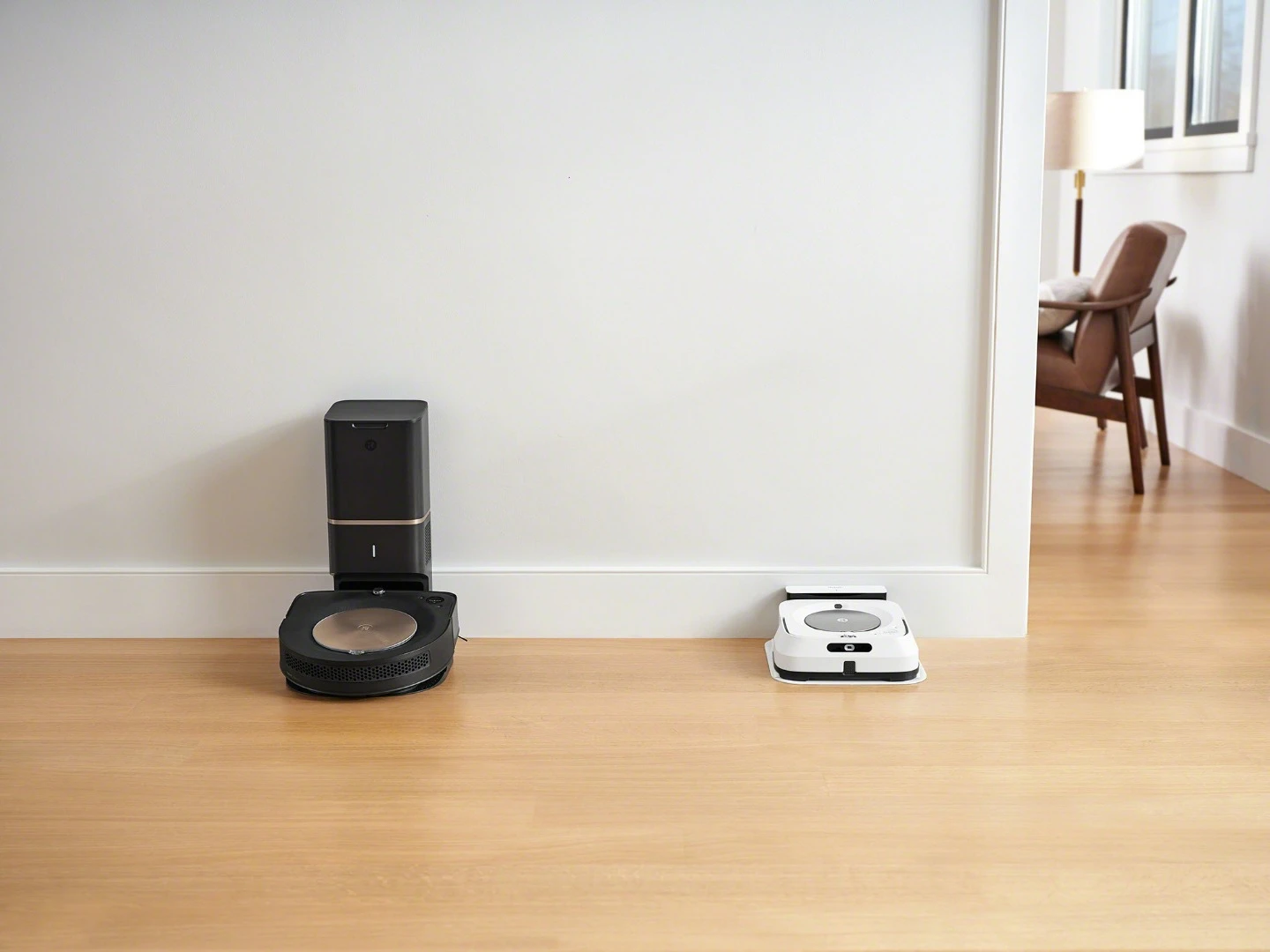 iRobot's Roomba s9+ robotic vacuum cleaner (left) and its Braava jet m6 mopping robot