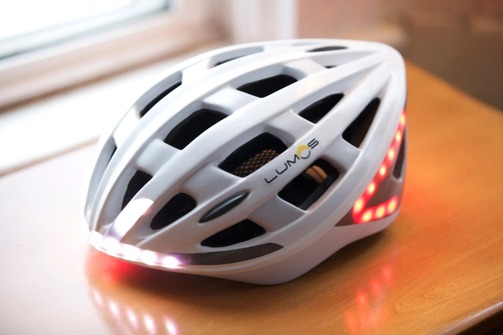 The white prototype of the Lumos bicycle helmet.