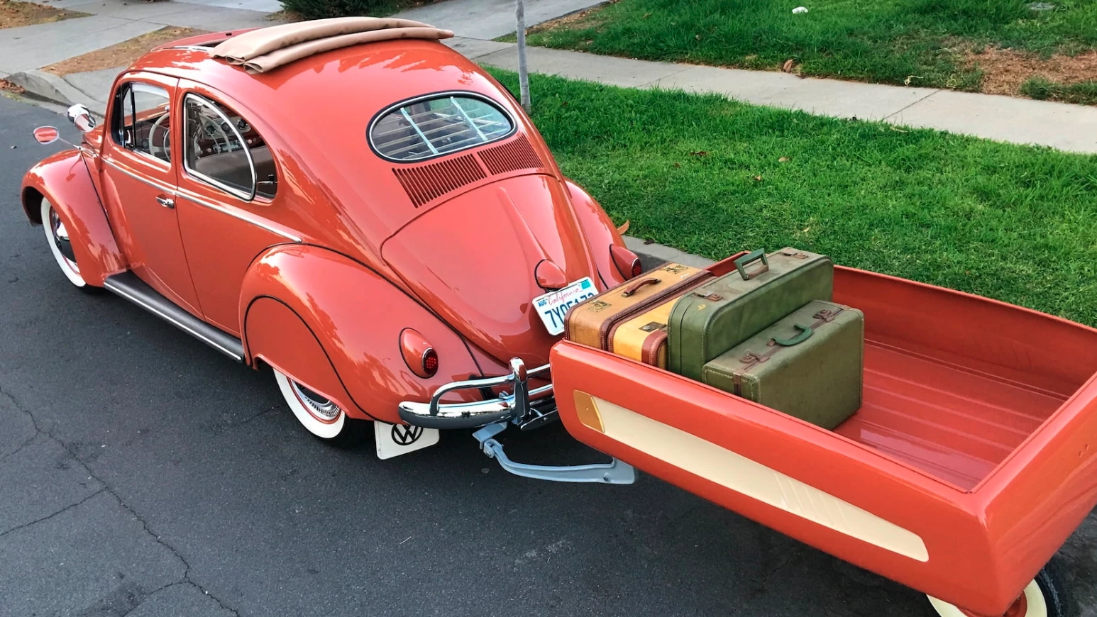 This 1957 Volkswagen Beetle and matching Sears Roebuck Allstate one wheel trailer sold for $61,600 at Barrett-Jackson's Scottsdale 2018 auction after selling for $55,000 at Mecum in a Las Vegas 2017 Auction