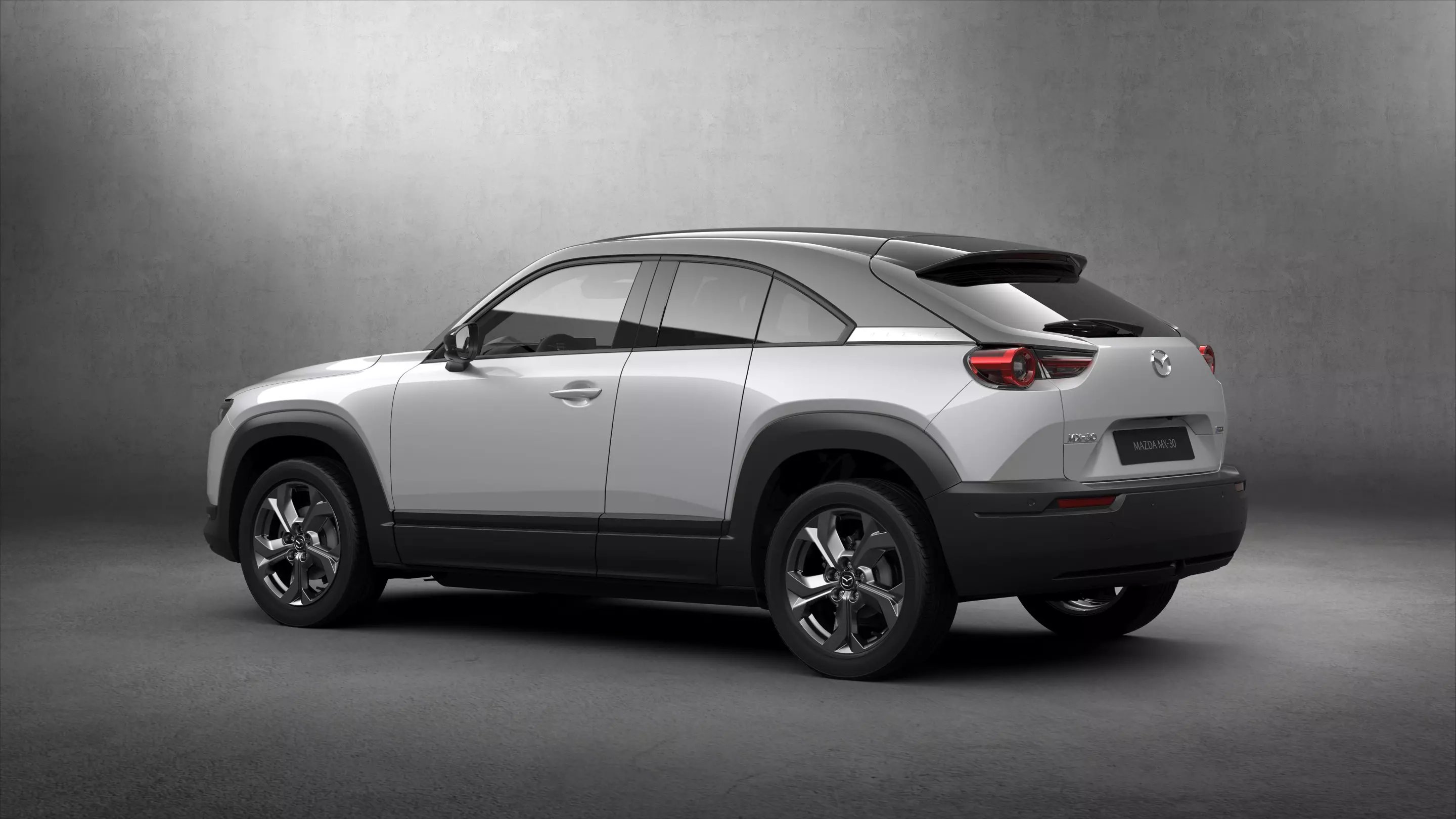 With doors closed, the Mazda MX-30 looks like any compact wagon or crossover