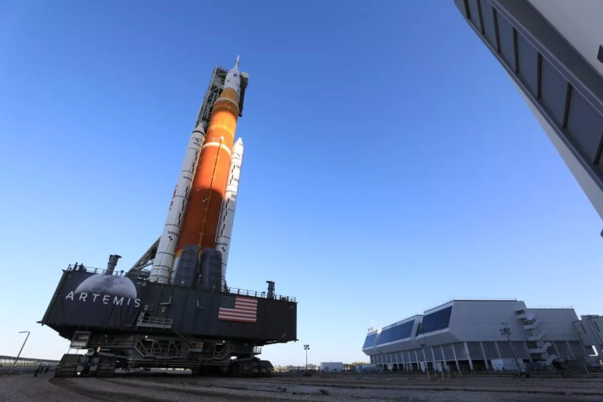 The integrated SLS rocket and Orion spacecraft en route to the launchpad