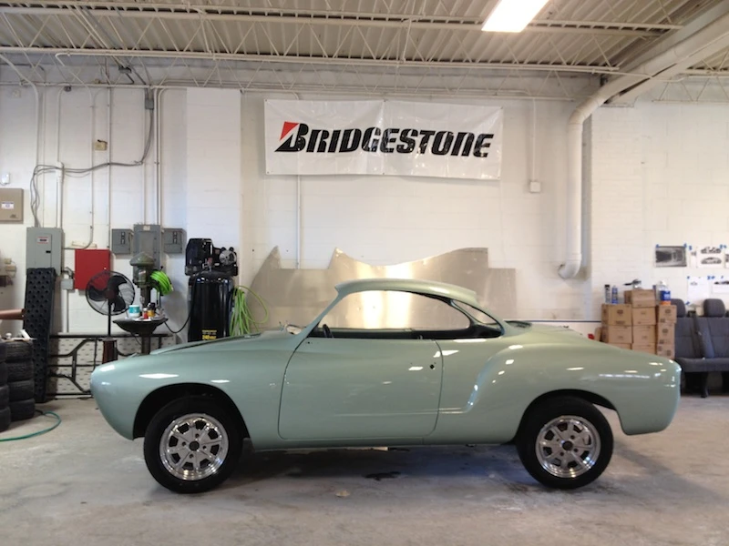 The reshaped and restored Ghia is given a fresh coat of paint