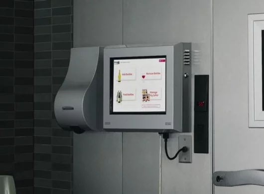 The touchscreen and scanner are next to the door of the wine vault