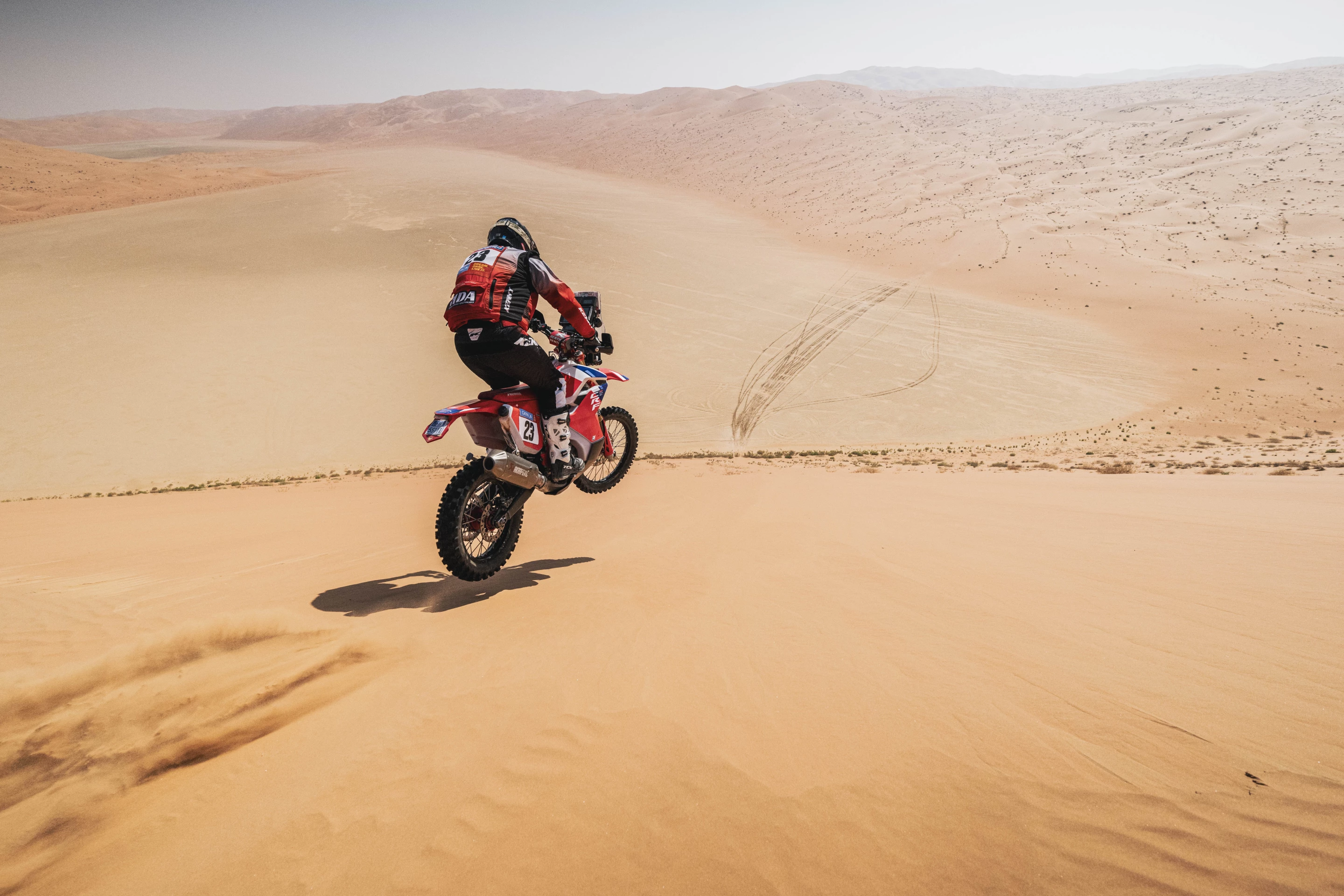 Southern California, USA's Jacob Argubright (#23), in his third Dakar finished a solid 22nd overall, competing for RSMoto Honda Rally Team. Here in Stage 11, he's seen throwing a little sauce in it for photographer Charly Lopez.