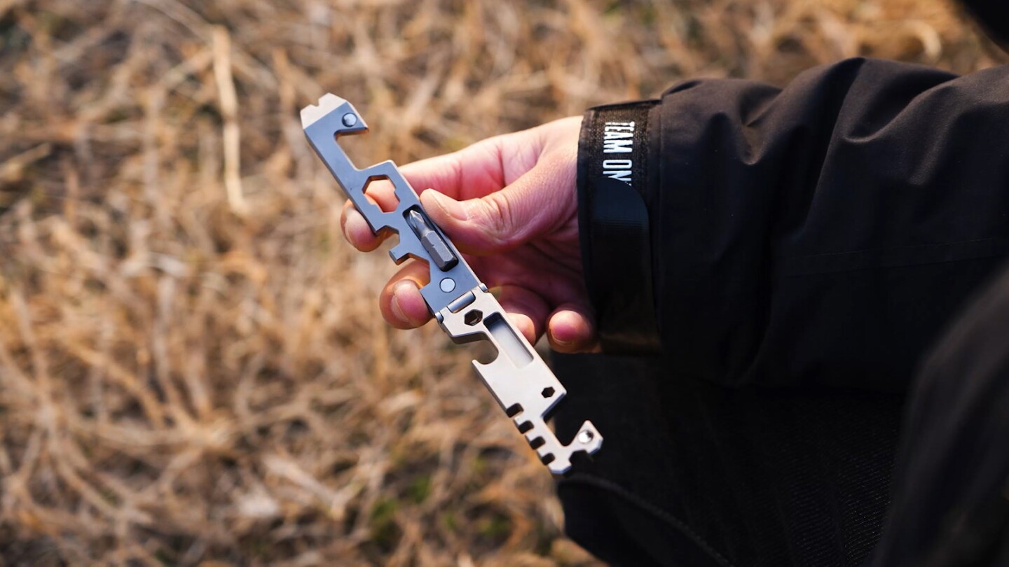 The AceStand features a nested Phillips-head screwdriver bit