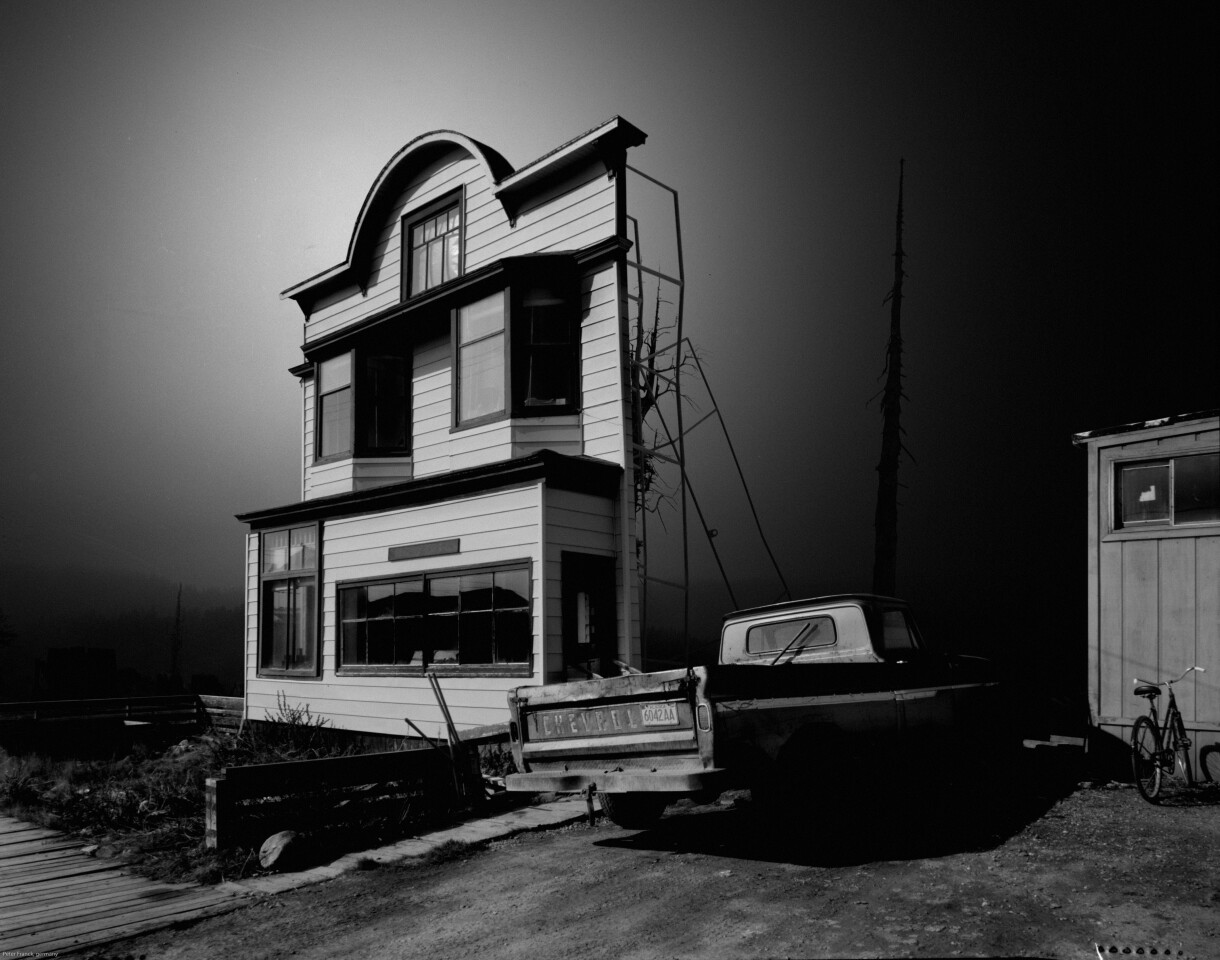 'Facade'. The images shown here are facades; it’s uncertain what purpose they serve. Are they a film set or a training camp for special forces?