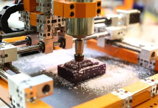 A 3D CNC router (computer controlled cutting machine) assembled from UberBlox, which is a new Lego-like metal construction and prototyping kit (Photo: UberBlox)