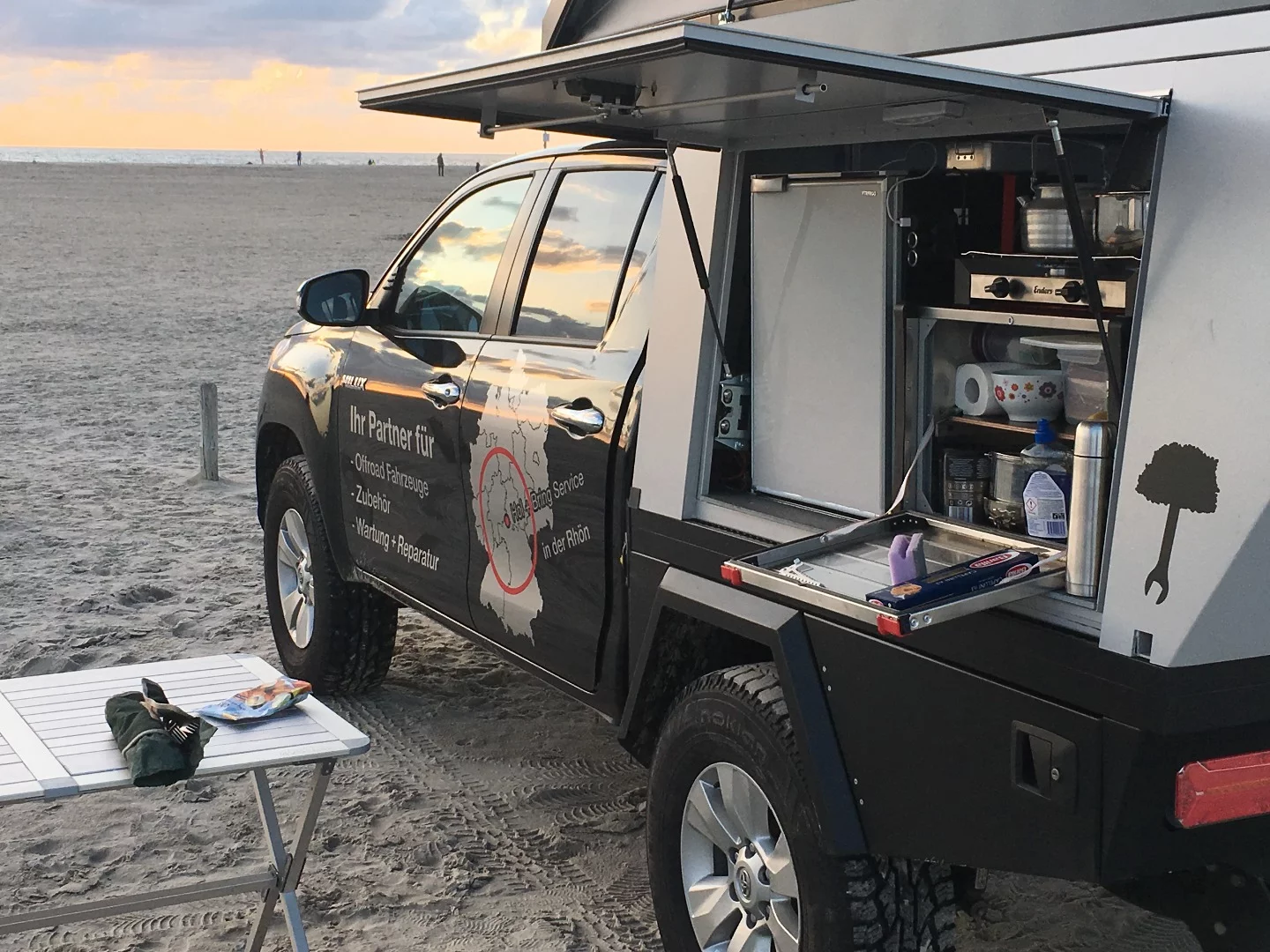 Fiftyten camper outfitted for outdoor cooking