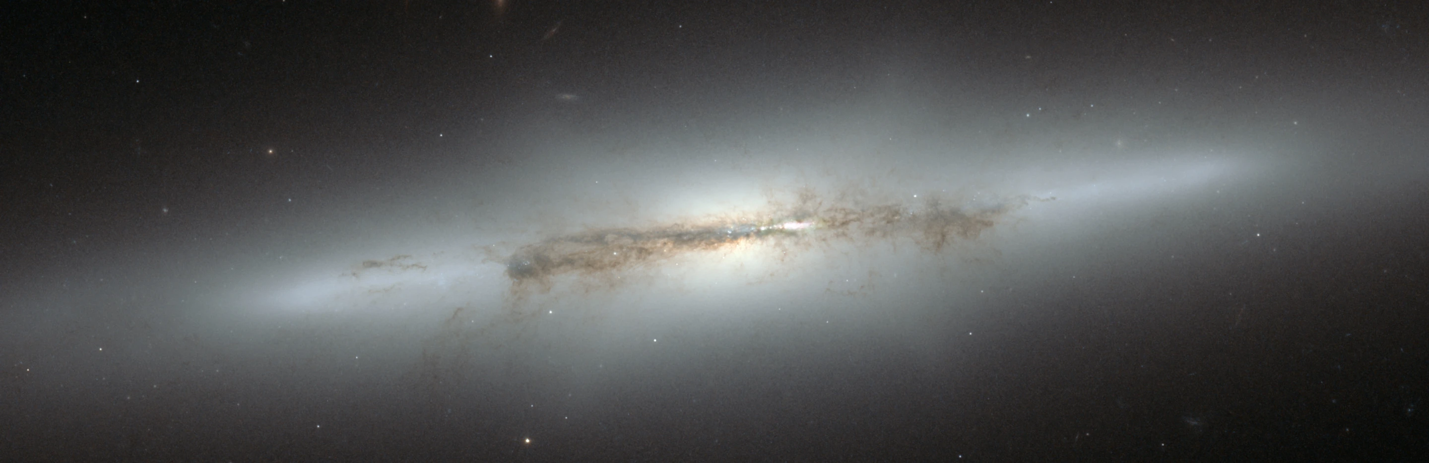 The NGC4710 galaxy as captured by the Hubble Space Telescope. The galaxy's core exhibits the same x-shape as that of the Milky Way (Image: NASA/ESA)