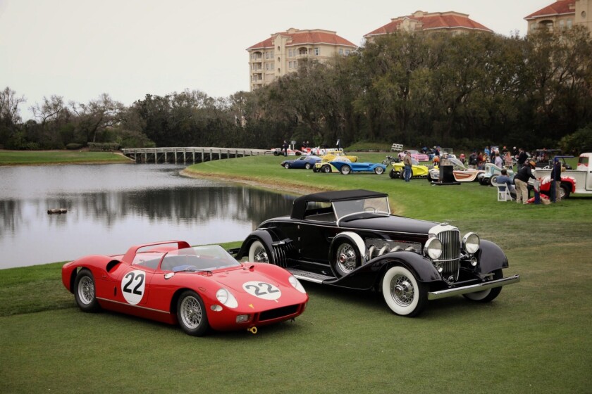 The Best in Show Concours d'Elegance Trophy was presented to a 1929 Duesenberg J/SJ Convertible and the Best in Show Concours de Sport Trophy went to a 1963 Ferrari 250/275P