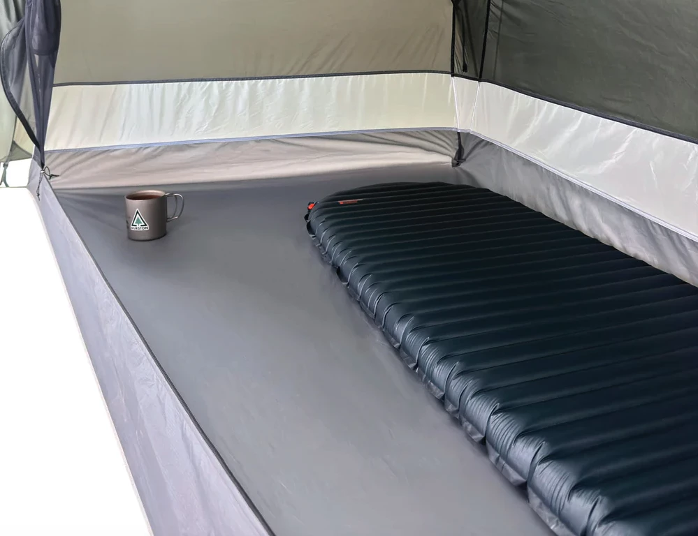 The X-Dome has a trapezoidal floor that measures 27 in wide at the foot and 50 in wide at the head