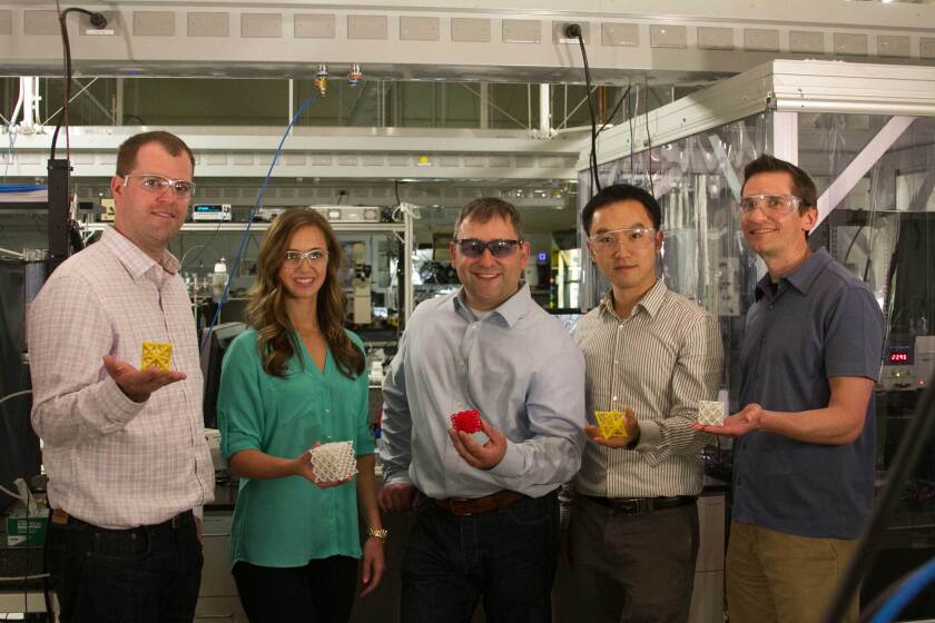 The LLNL research team with examples of microstructure cells (Image: LLNL)