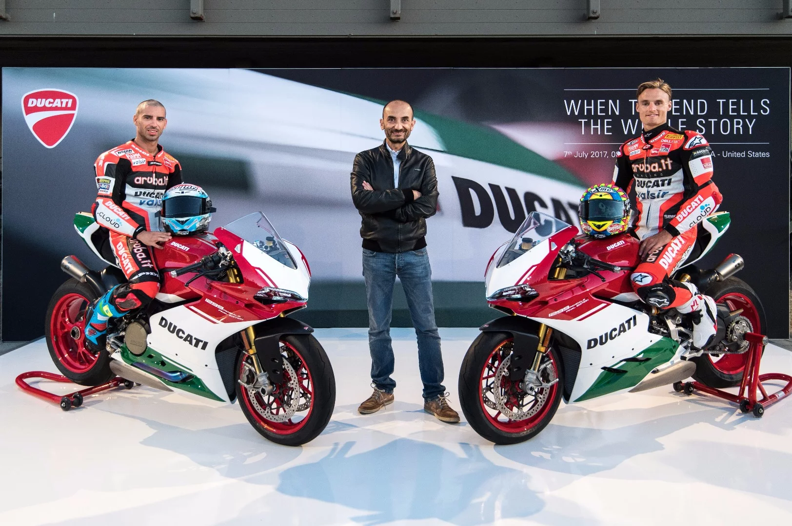 Ducati CEO, Claudio Domenicalli, poses between the company's WSBK riders, Marco Melandri (left) and Chaz Davies (right), during the unveiling of the 1299 Panigale R Final Edition
