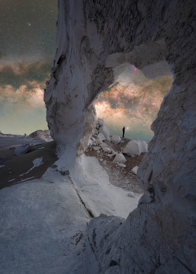 Egyptian Nights. The Milky Way peeks through a rock formation in Egypt's White Desert