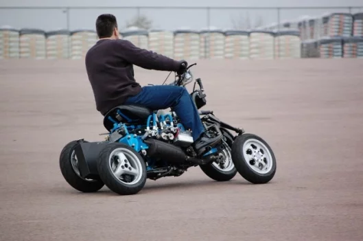 Can a motorcycle have four wheels?
