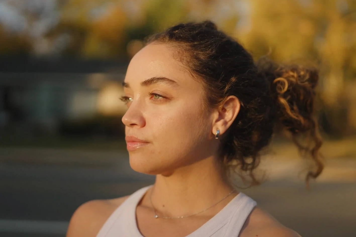 From a distance, the earrings are hardly noticeable  