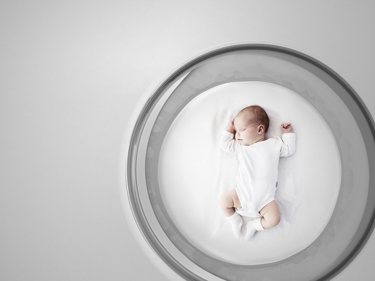 The transparent Bubble Baby bed can rock in any direction up to a 17 degree angle, but will return to an upright position thanks to a plexiglass weight center