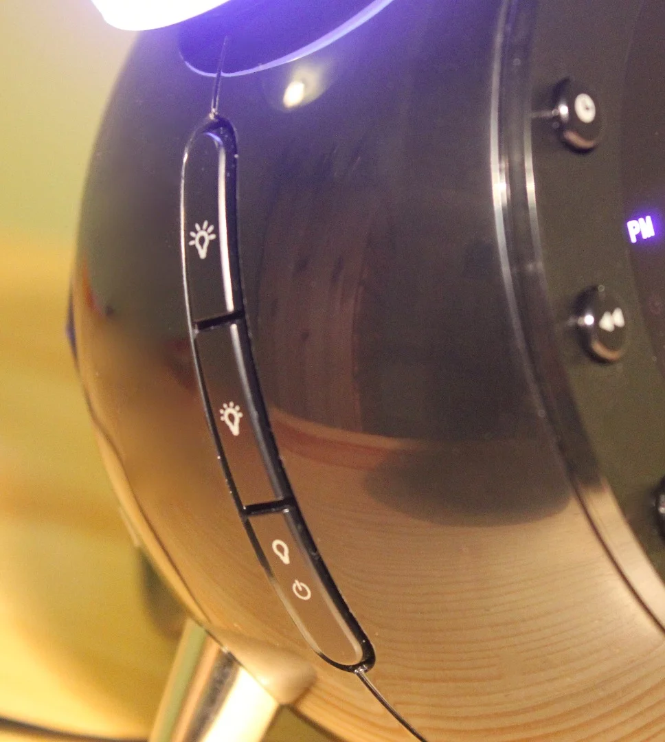 The Retro Alarm Clock Radio's lamp/display brightness controls