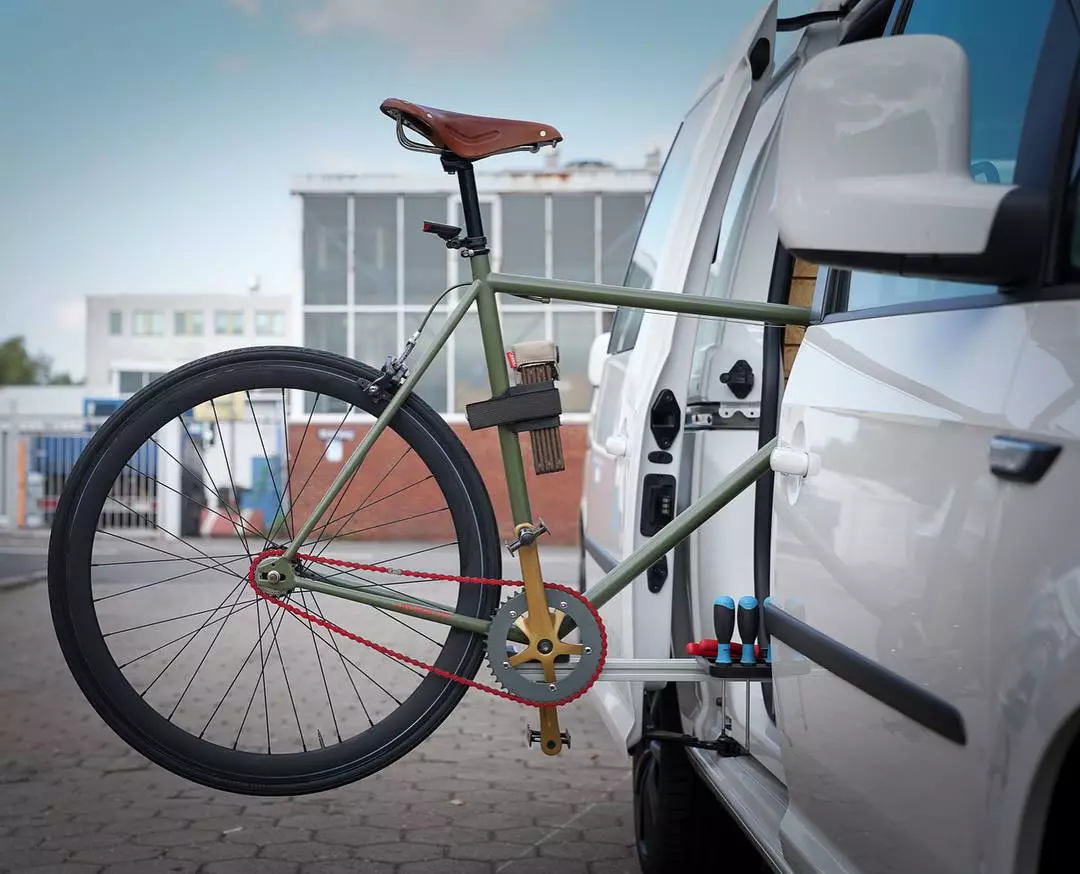 Mounting the bicycle in the side door, rather than the back