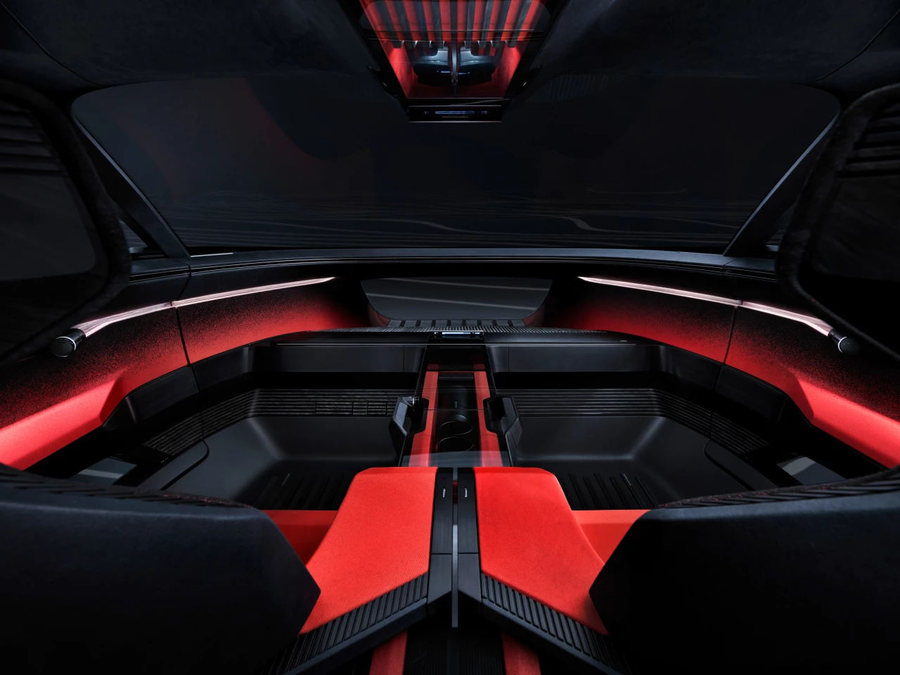 In autonomous mode, all driving gear retracts away, leaving an open, clean cockpit with views of the road ahead