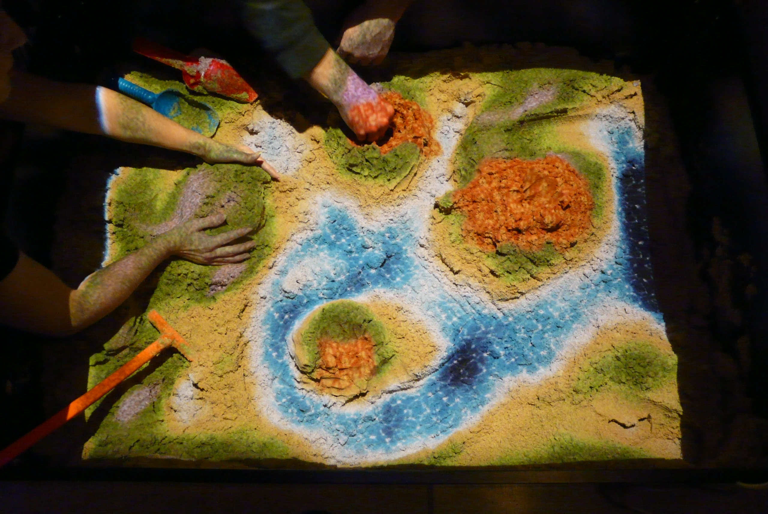The Xbox Kinect can almost immediately respond to any changes made in the sand pit to alter the image accordingly.