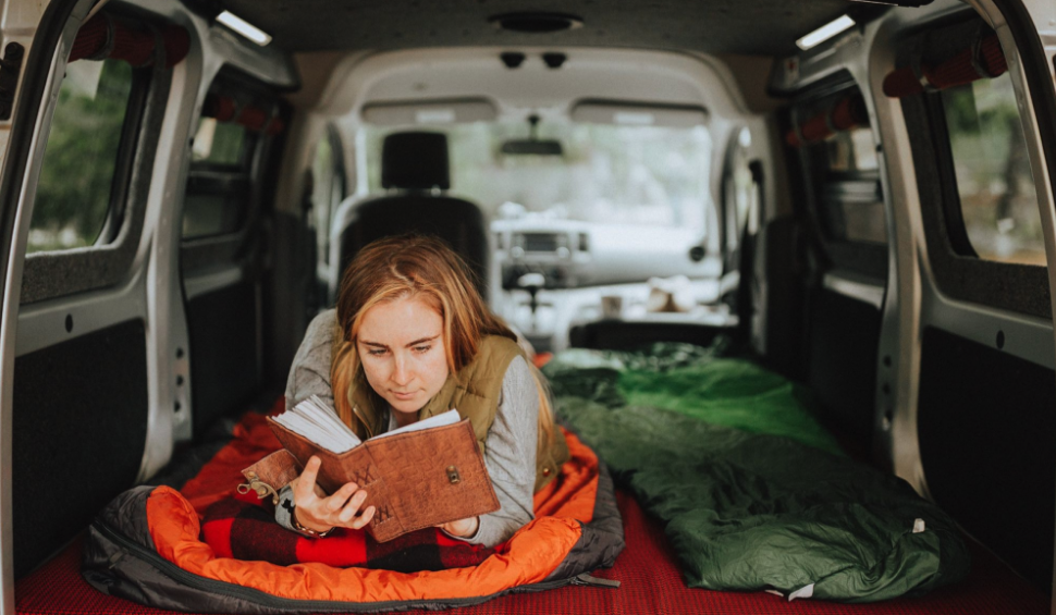 With a couple of camper boxes as the base and four individual cushions on top, the Free Bird interior turns into a full-size bed