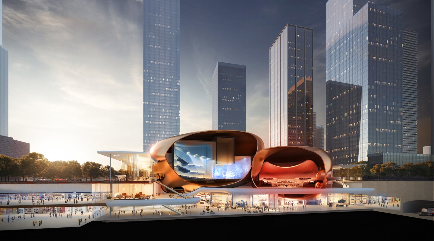 The People's Performing Arts Center will be defined by two large golden egg-like structures that host performance spaces