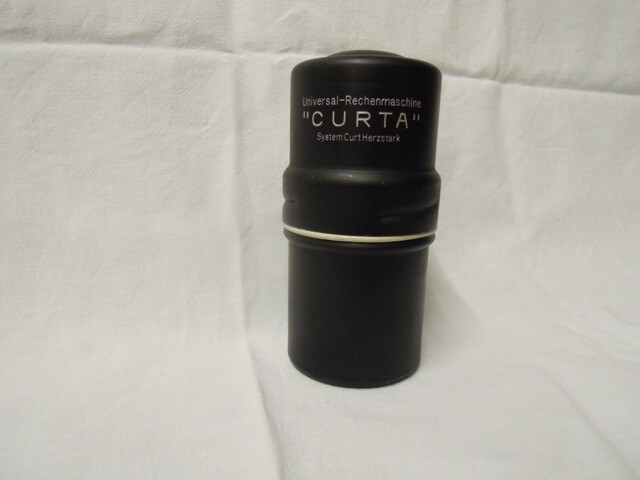 A Curta calculator case