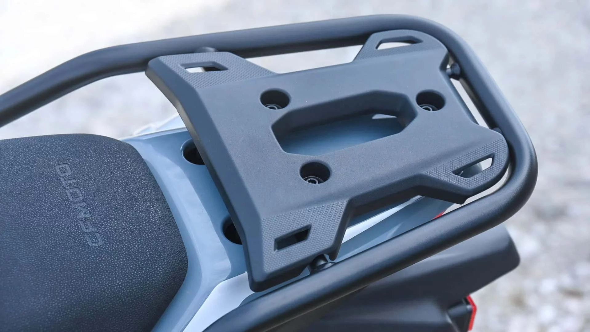 A luggage rack with grab rails is a neat addition