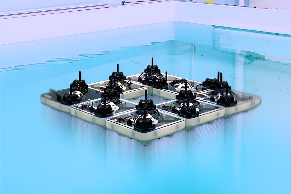 Robotic tiles autonomously Lego-snap into floating smart structures