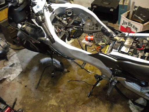 The engine and transmission were ripped out to make room for a battery pack, electric motor, controller and other components