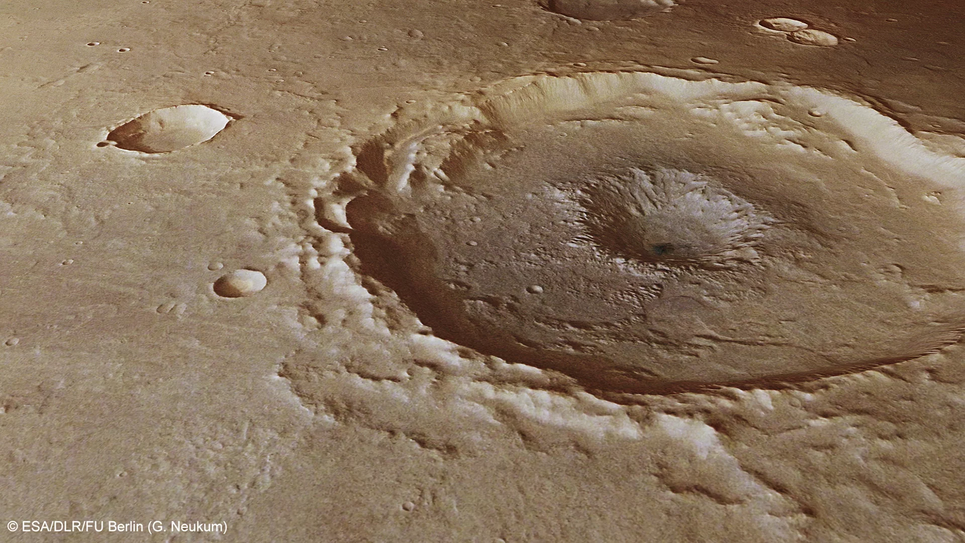A perspective view of a 50 km diameter crater in Thaumasia Planum (Credit: ESA/DLR/FU Berlin (G. Neukum), CC BY-SA 3.0 IGO)