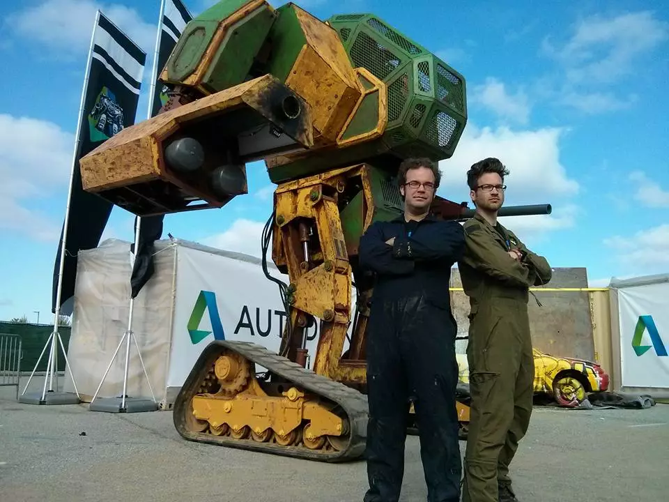 The 15-foot tall Megabot, with co-creators Gui Cavalcanti and Matt Oehrlein