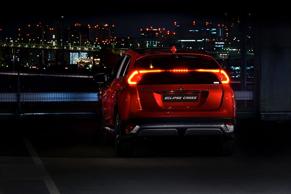 Mitsubishi sends light clean across the rear, cutting the windshield in half