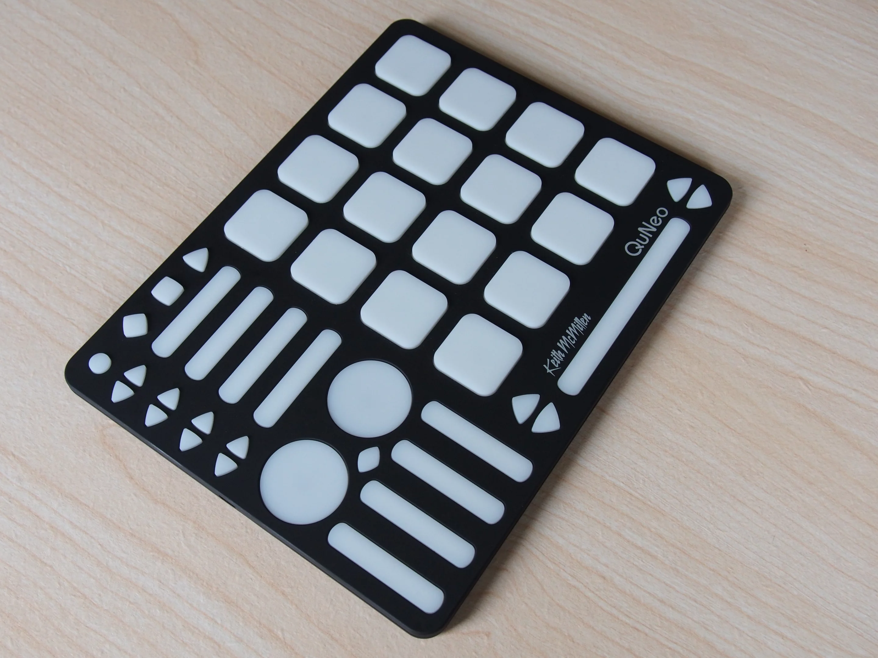 The QuNeo sports a mixture of pressure-sensitive touch sliders, velocity-sensitive pads, and 251 programmable LED lights, with 16 levels of brightness