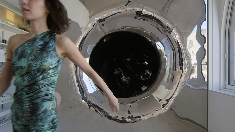 Emerging from the mouth of the impressive 80-foot (24-meter) slide (Photo: David Hoston)