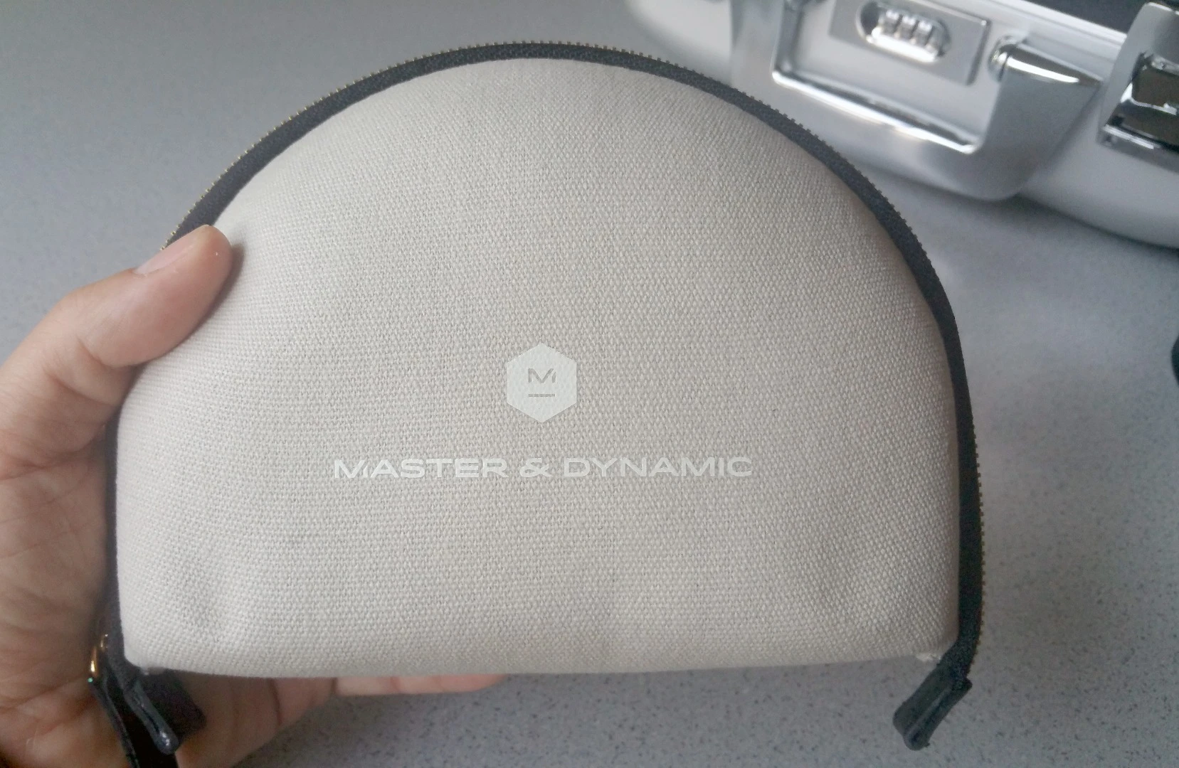 The included zippered canvas case keeps the Master & Dynamic MW60 headphones free from scuffs during transportation