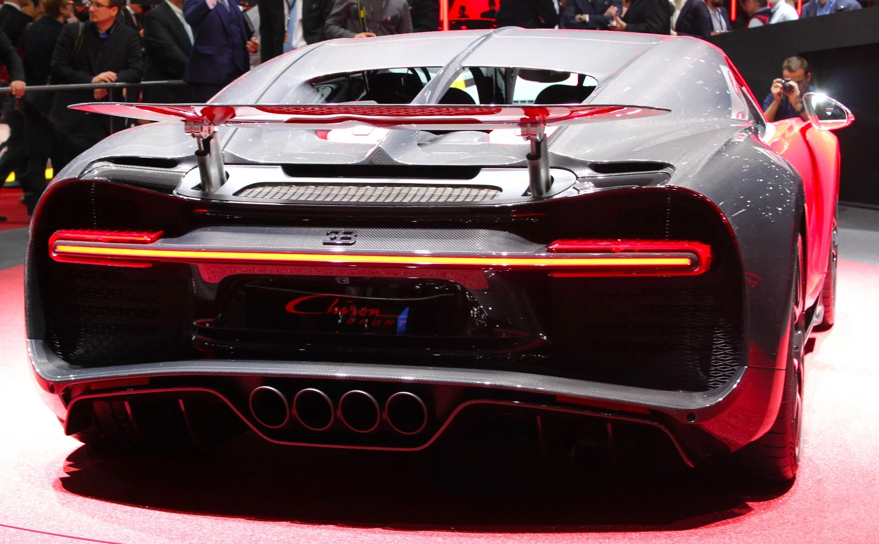 The rear of the car features a prominent "16" on the radiator grille, referring to the car's 16 cylinders in a W format